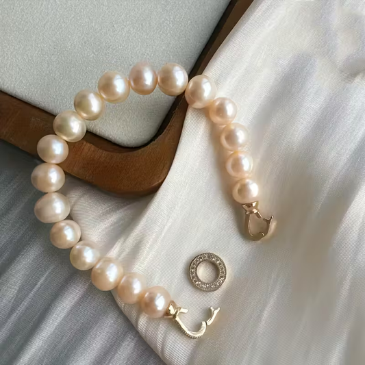 Women's Freshwater Freshwater Pearls Bracelet with Golden-Tone Heart Pendant - Minimalist White & Pink Freshwater Pearls, Adjustable Elastic-like Chain (No Clasp), February Birthstone Jewelry Gift