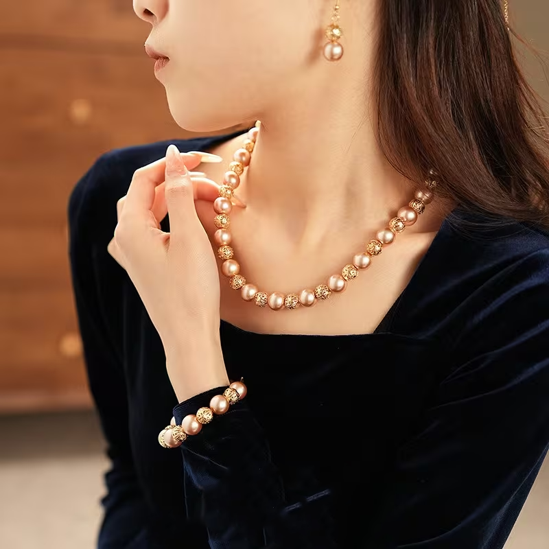 Women'S Elegant Hollow Pearl Beaded Necklace ，bracelet  and  Earrings Set