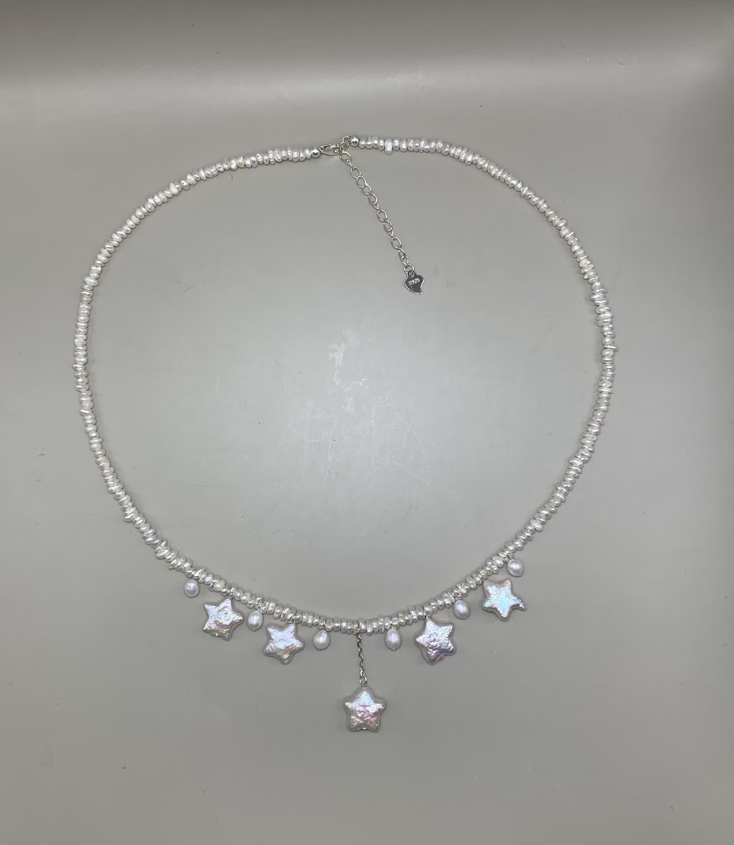 Star-themed freshwater baroque pearl necklace, designed with three different Pearl,sterling silver