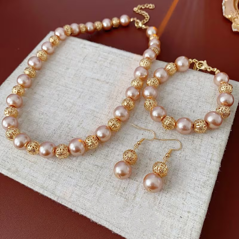Women'S Elegant Hollow Pearl Beaded Necklace ，bracelet  and  Earrings Set
